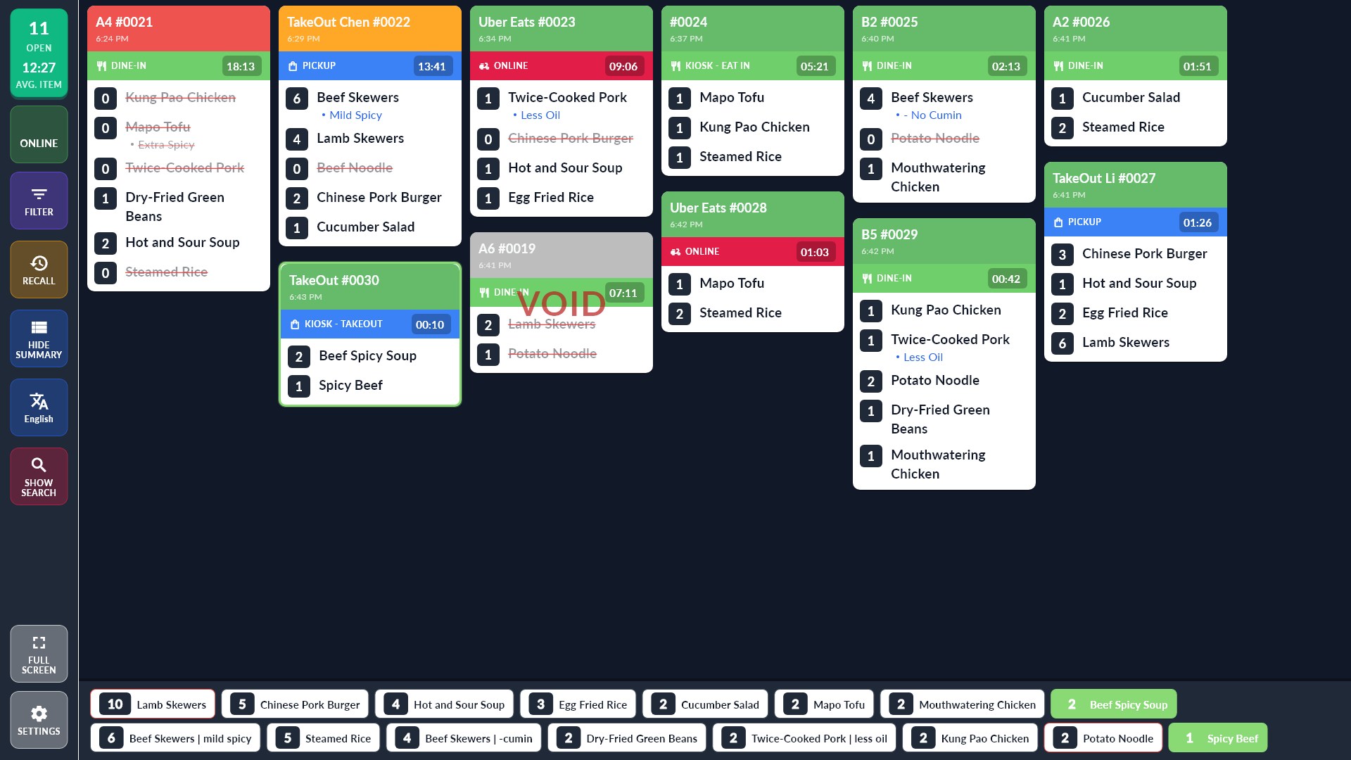 Kitchen display in the Tiled layout with Fill gaps: eleven tickets in six columns, each new ticket placed in the shortest column. The newest, a kiosk takeout order, is outlined in green and only its dishes are green in the summary bar.